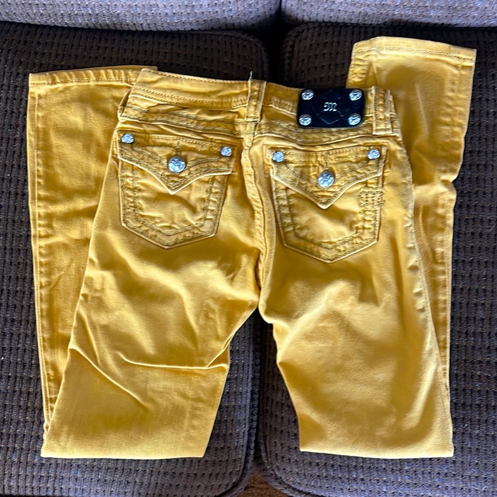 Yellow pair of kids Miss Me skinny jeans. Like new